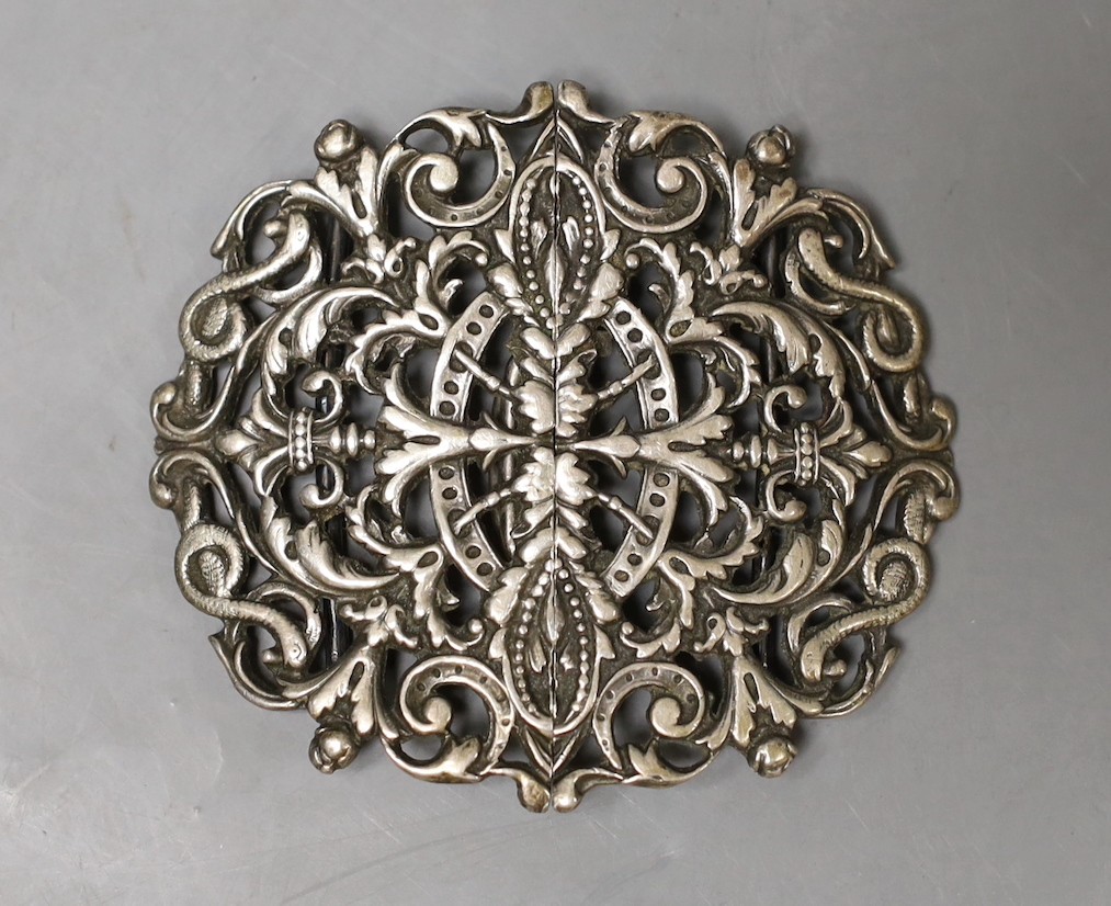 A late Victorian pierced oval silver nurses buckle, maker CM, Birmingham, 1899, 68mm.